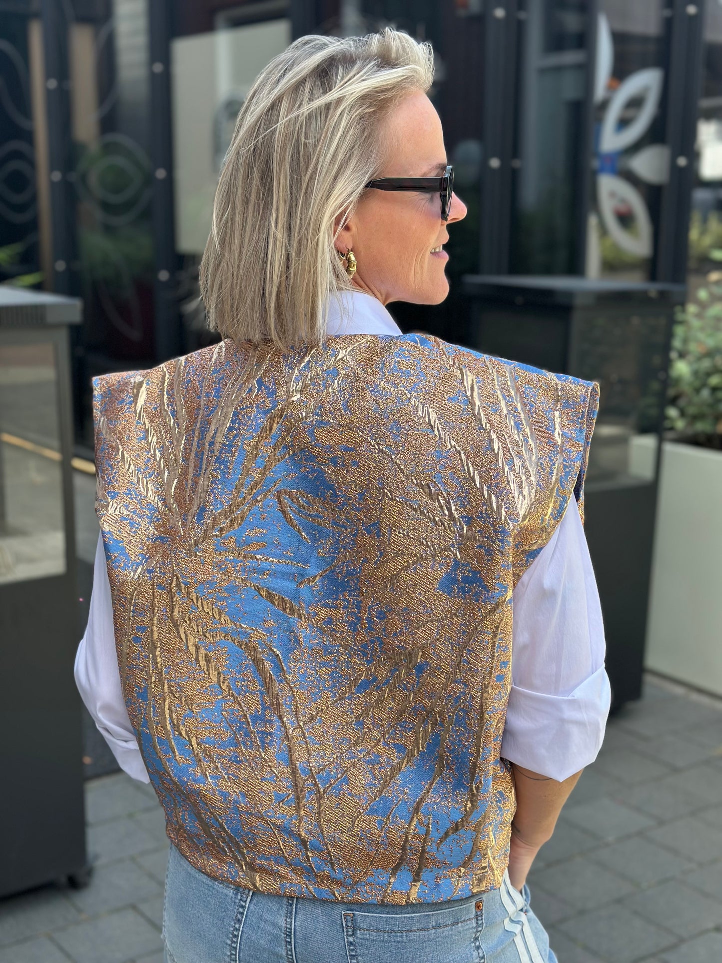 Metallic gilet licht blauw en brons