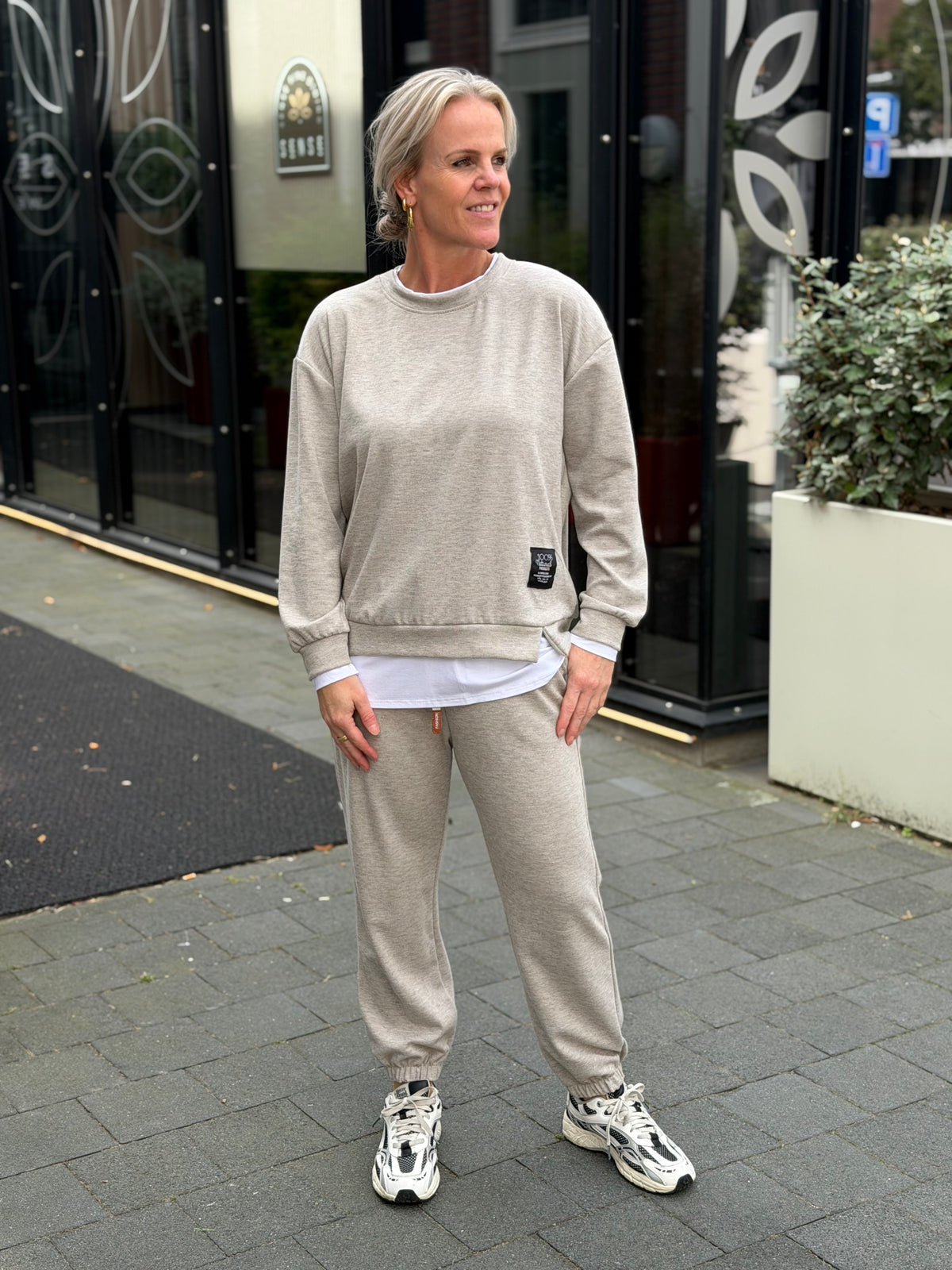 Tweedelig sweat pak beige