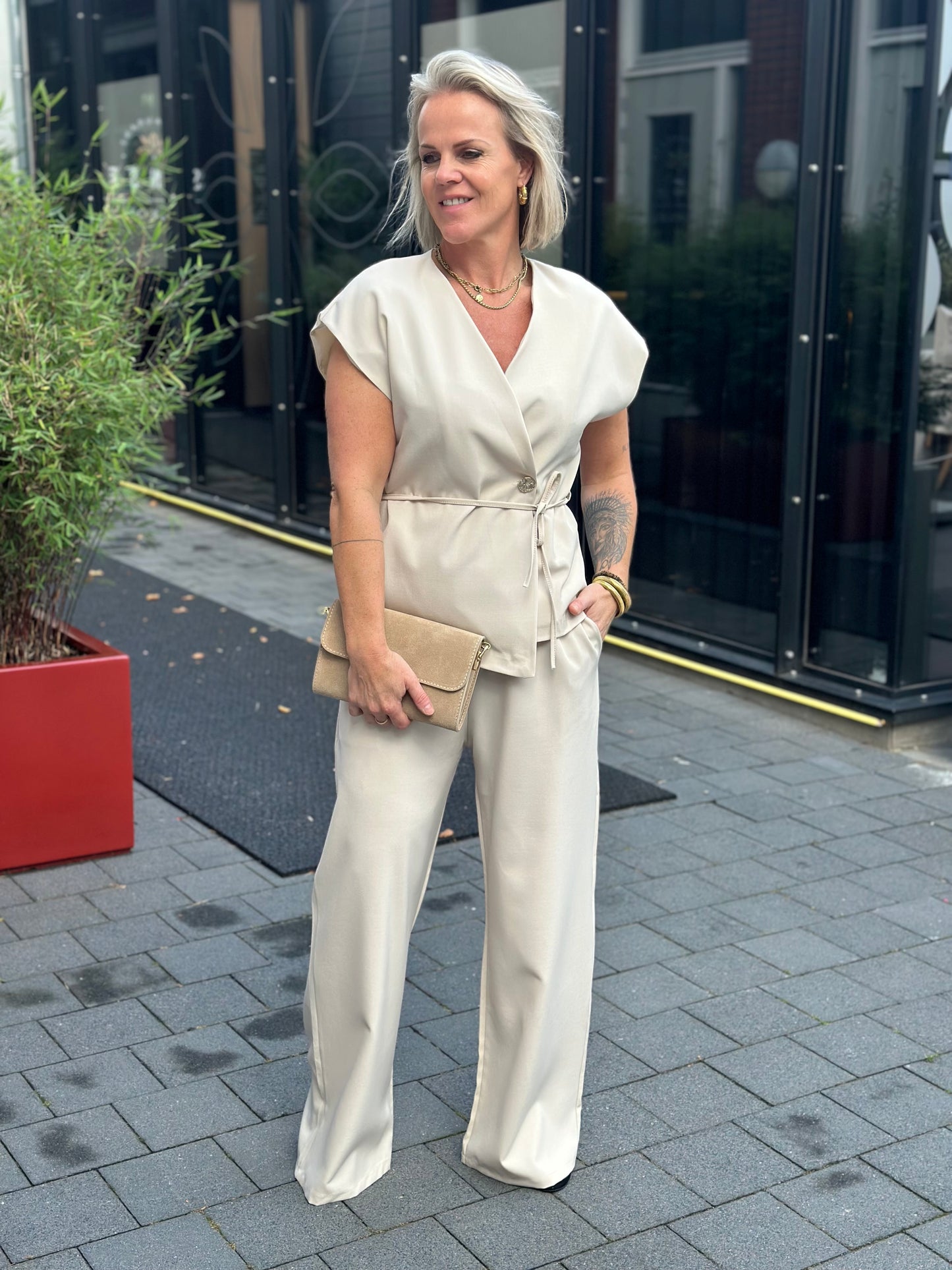 Tweedelige set broek en gilet beige
