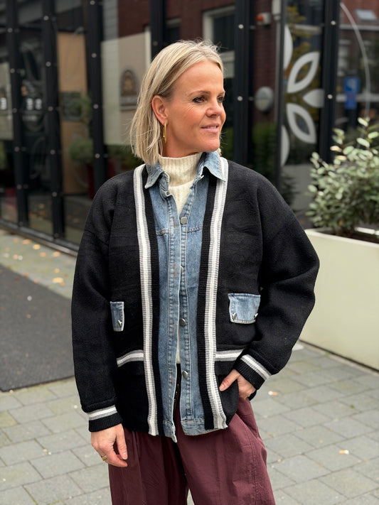 Zwart vest met jeans details