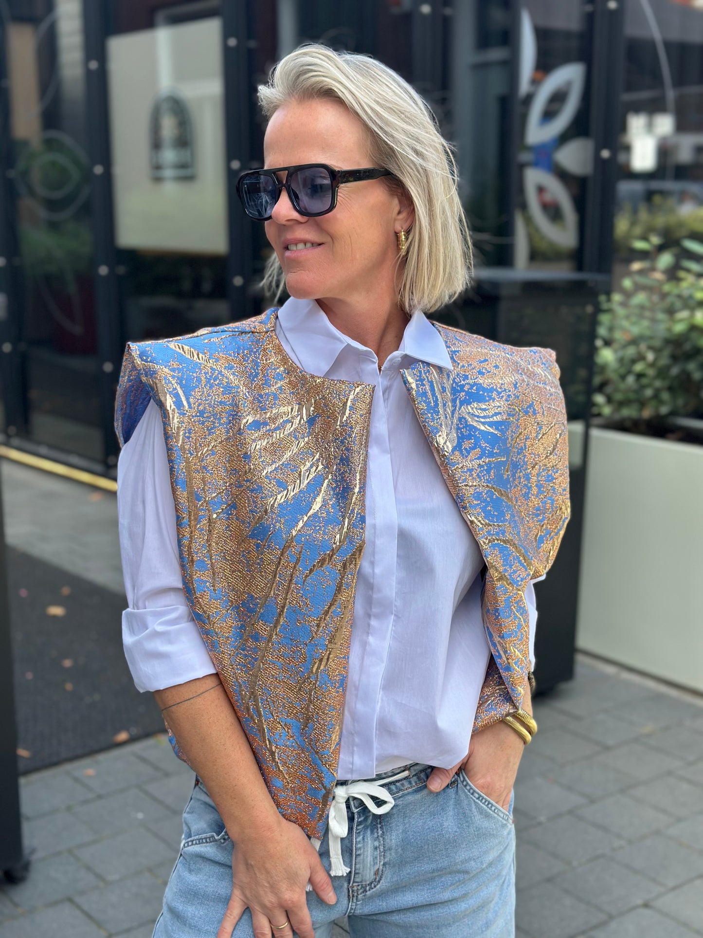 Metallic gilet licht blauw en brons