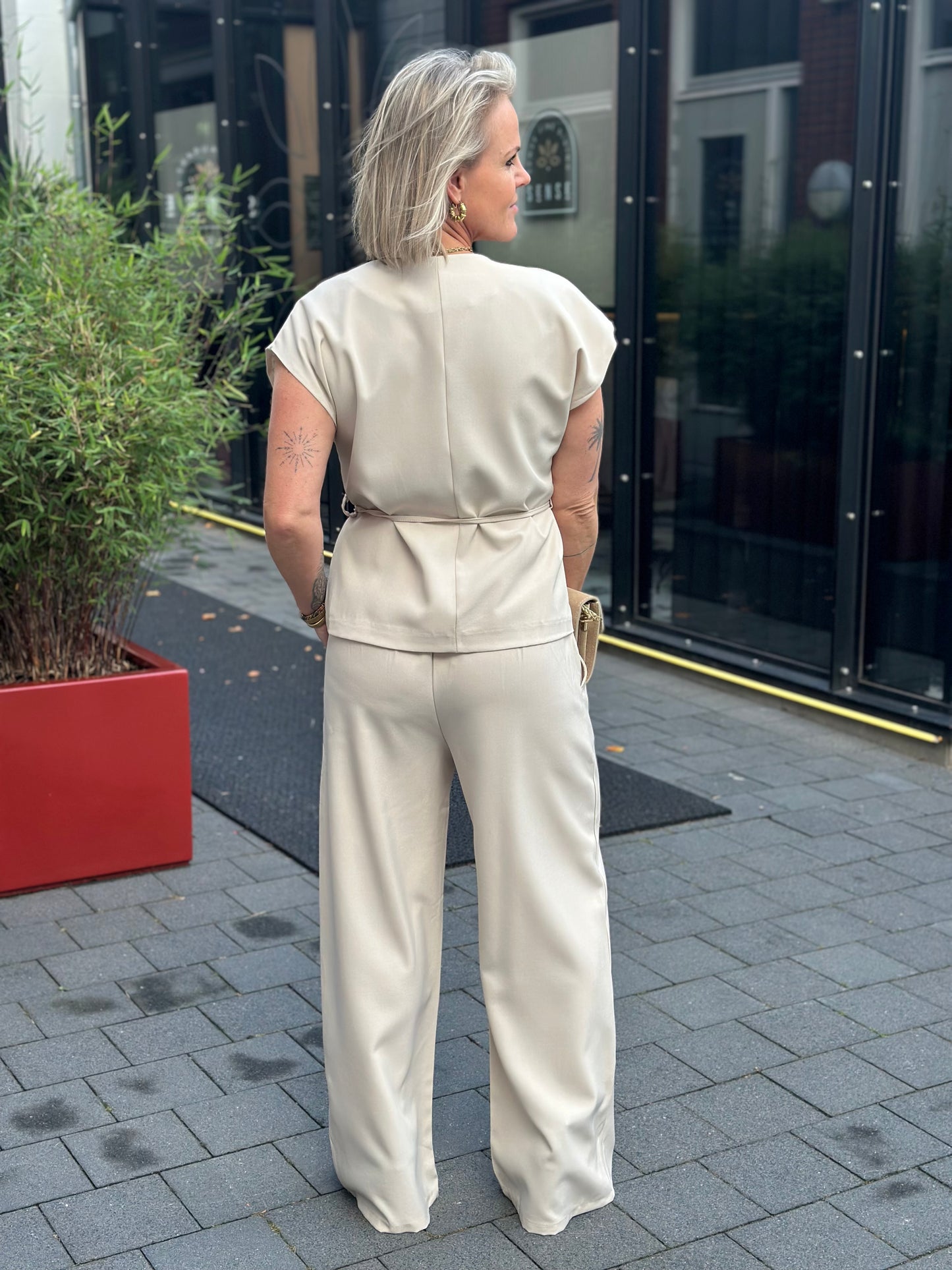 Tweedelige set broek en gilet beige